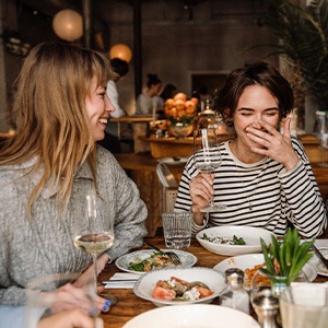 Group of friends enjoying dinner together
