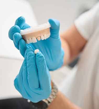 Benefits of getting a dental crown include the ability to keep your natural tooth without needing an extraction