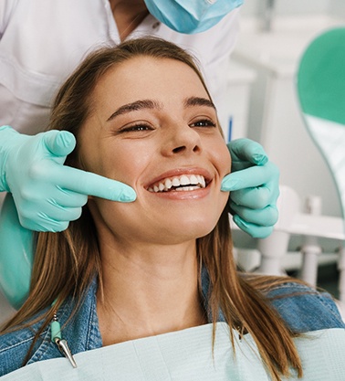 Woman smiling in the dental chair